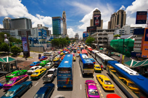 Bangkok Taxis and buses at the busy Rachaprasong junction in bangkok